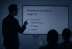 Presenter pointing to an insurance education slide in front of a seated audience